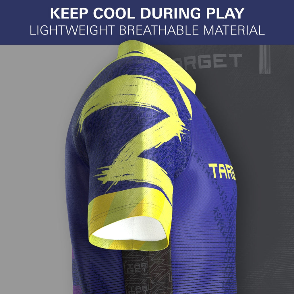 A close-up of the Professional Darts Corporation Luke Littler 2026 Playing Shirt in blue and yellow, featuring bold sleeves, the TARGET logo, and “KEEP COOL DURING PLAY” and “LIGHTWEIGHT BREATHABLE MATERIAL” text.