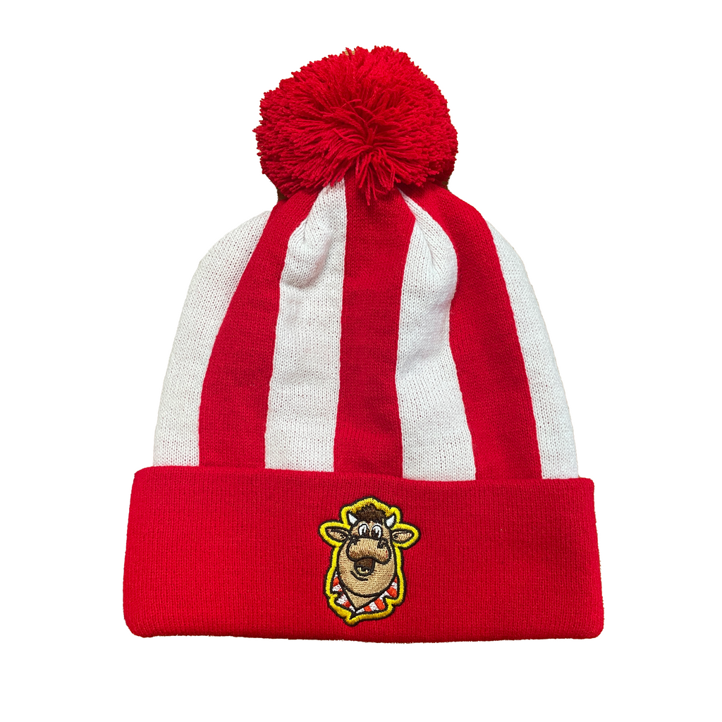 The Professional Darts Corporation Bullseye Beanie features red and white stripes, a red pom-pom, and an embroidered cartoon cow face on the front of the folded brim.